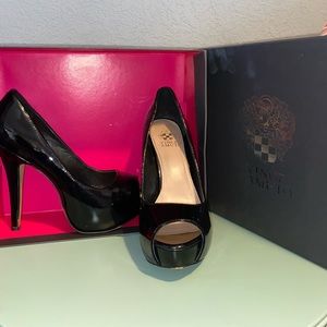 Black 6.5 Vince Camaro wedged open toe heels.